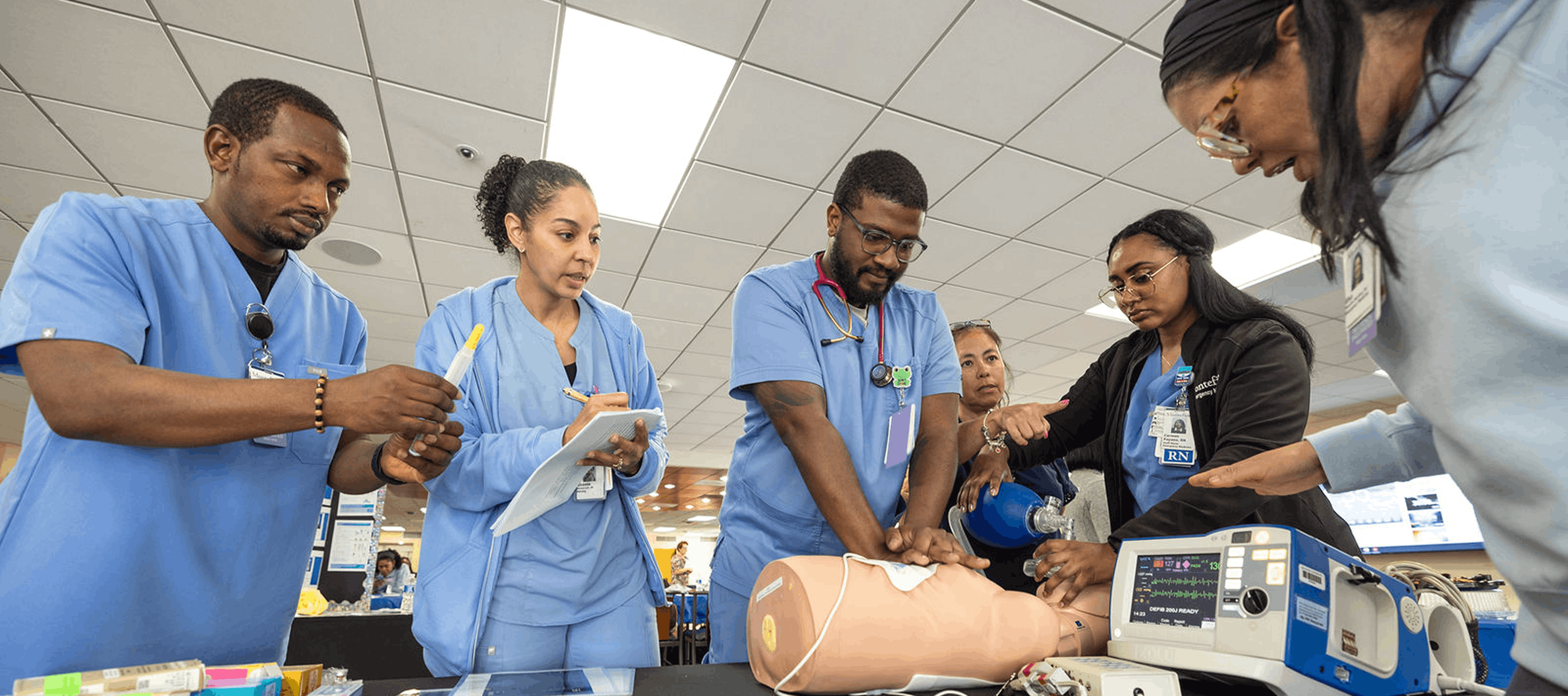 Doctor practicing on dummy