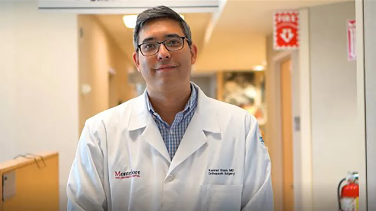 Photo of Dr. Gruson in a hallway