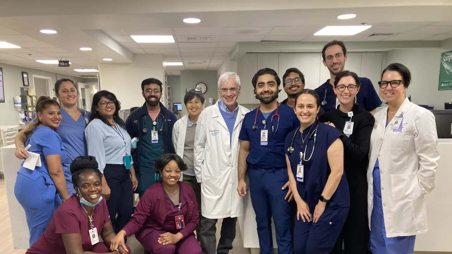Team members at Wakefield Hospital’s telemetry unit include nurse manager Armila Baksh (3rd from left); Dr. Grace Kajita, residency program director (5th from left); cardiologist Dr. Mark Greenberg (center, in white coat); and Dr. Jessica Dekhtyar, Wakefield medical director (2nd from right). 