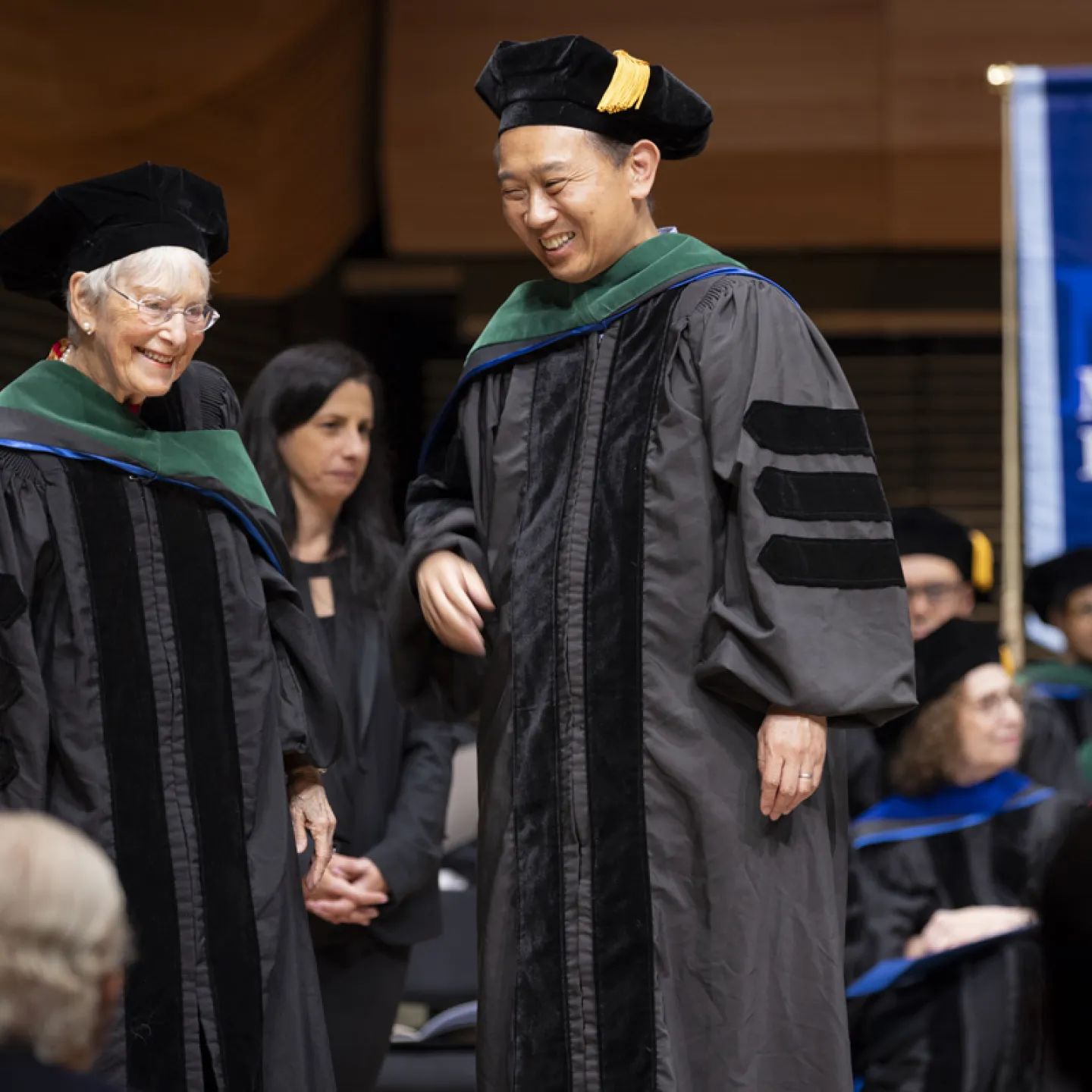 graduate walking across the stage