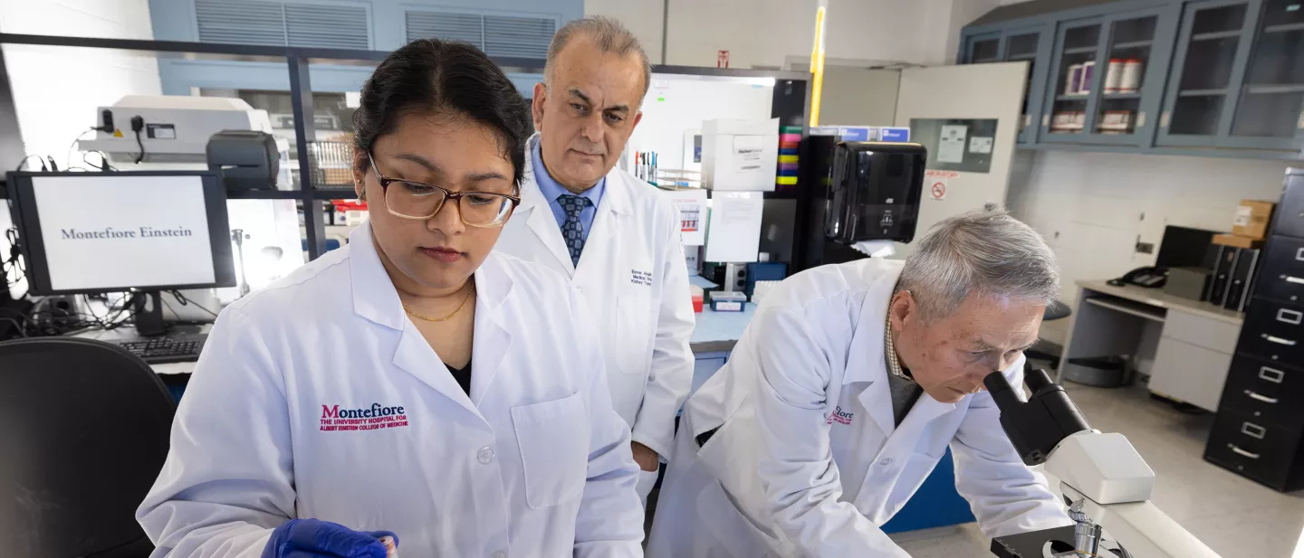 Three physicians working in the transplant tissue lab
