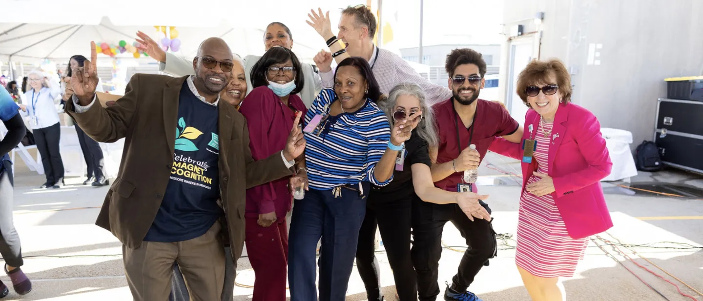 Group of men and women having fun smiling for the camera