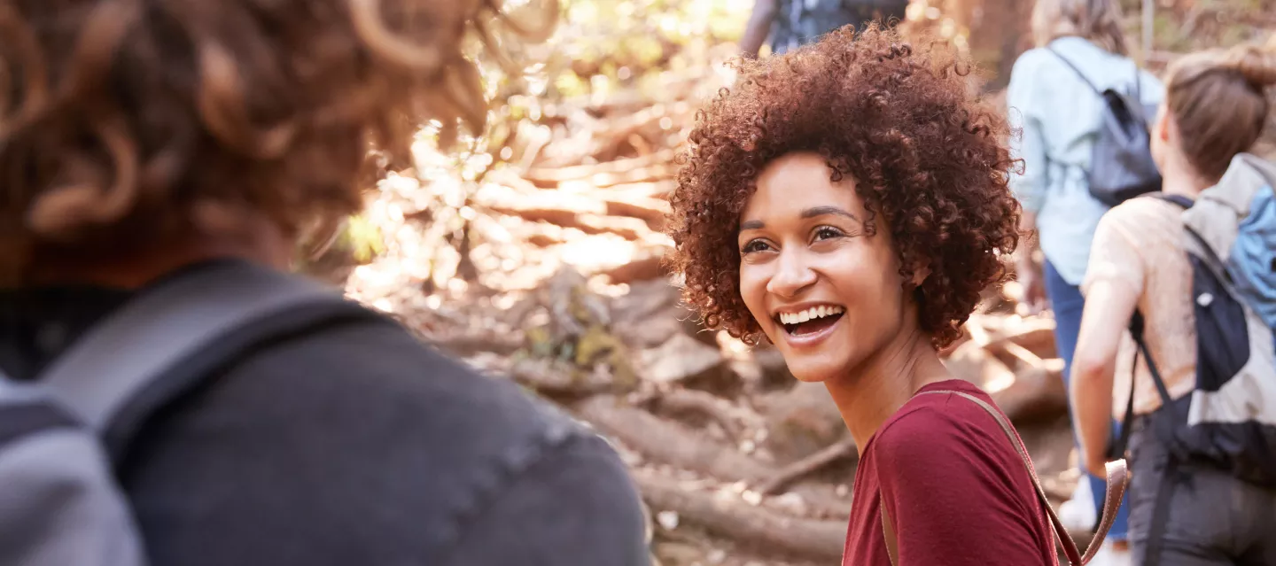 A group of friends hiking outside