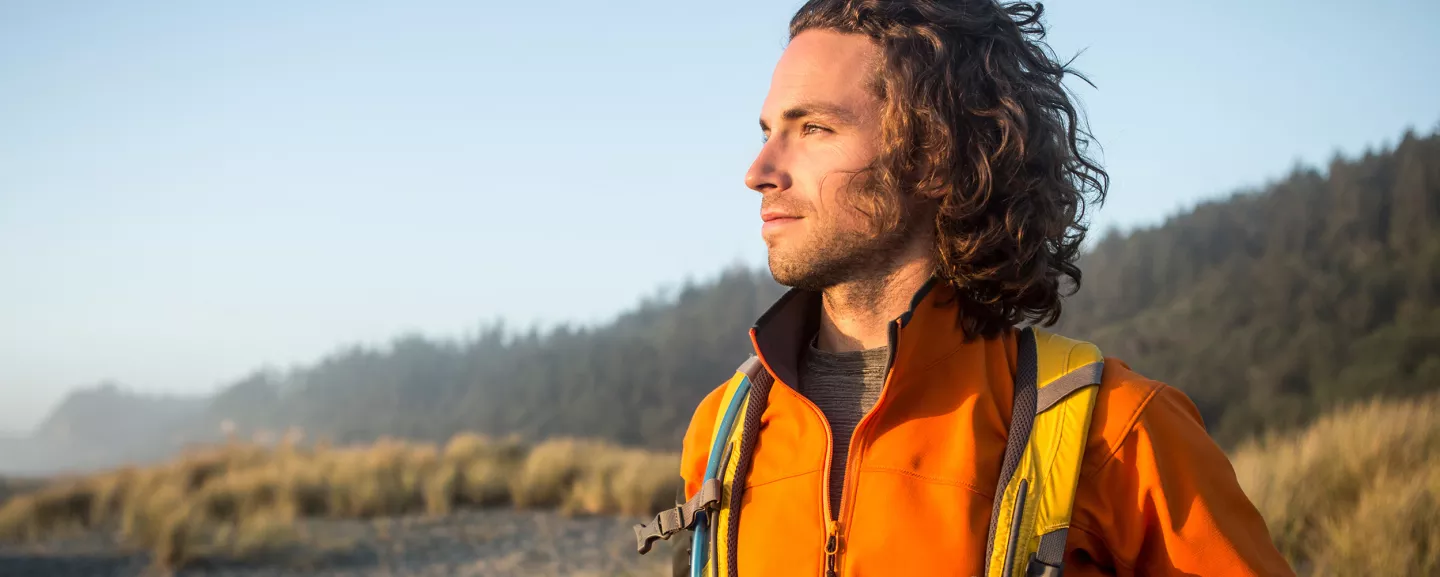Man hiking near the ocean