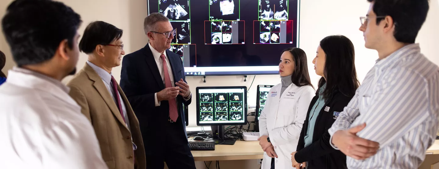 A group of fellows in the Echo Reading Room
