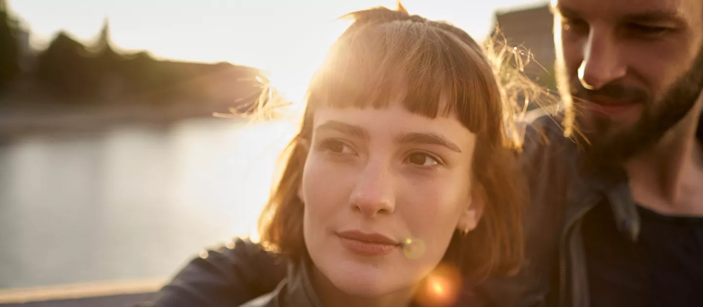 Young couple by the riverside
