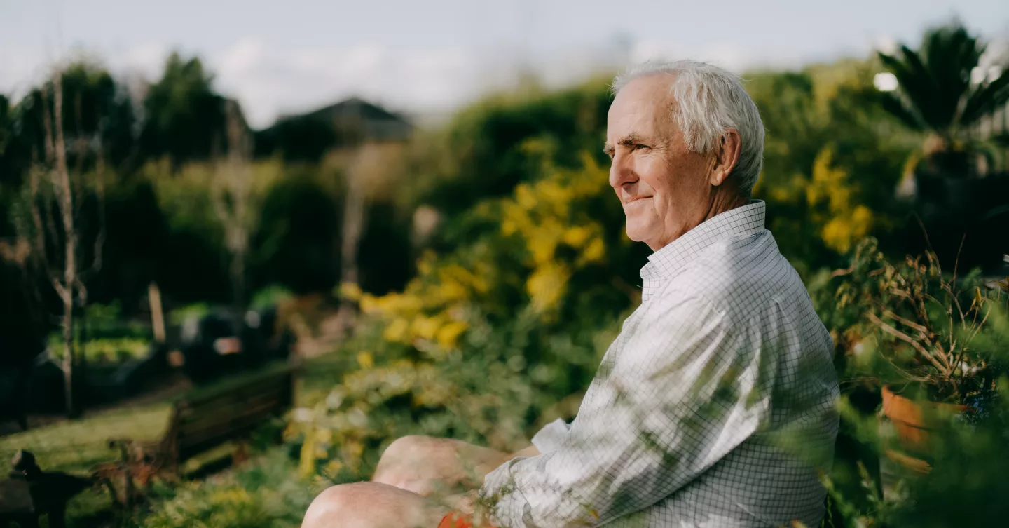 A man sitting outside enjoying the view
