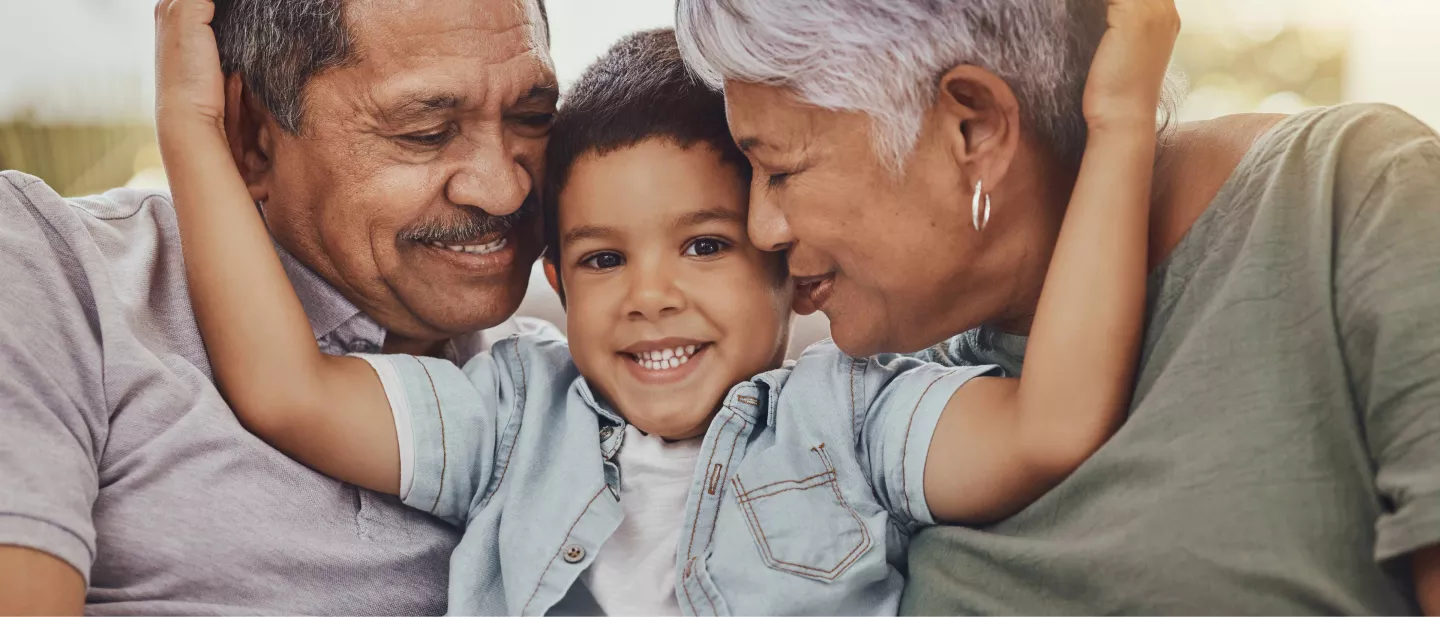 Child hugging parents