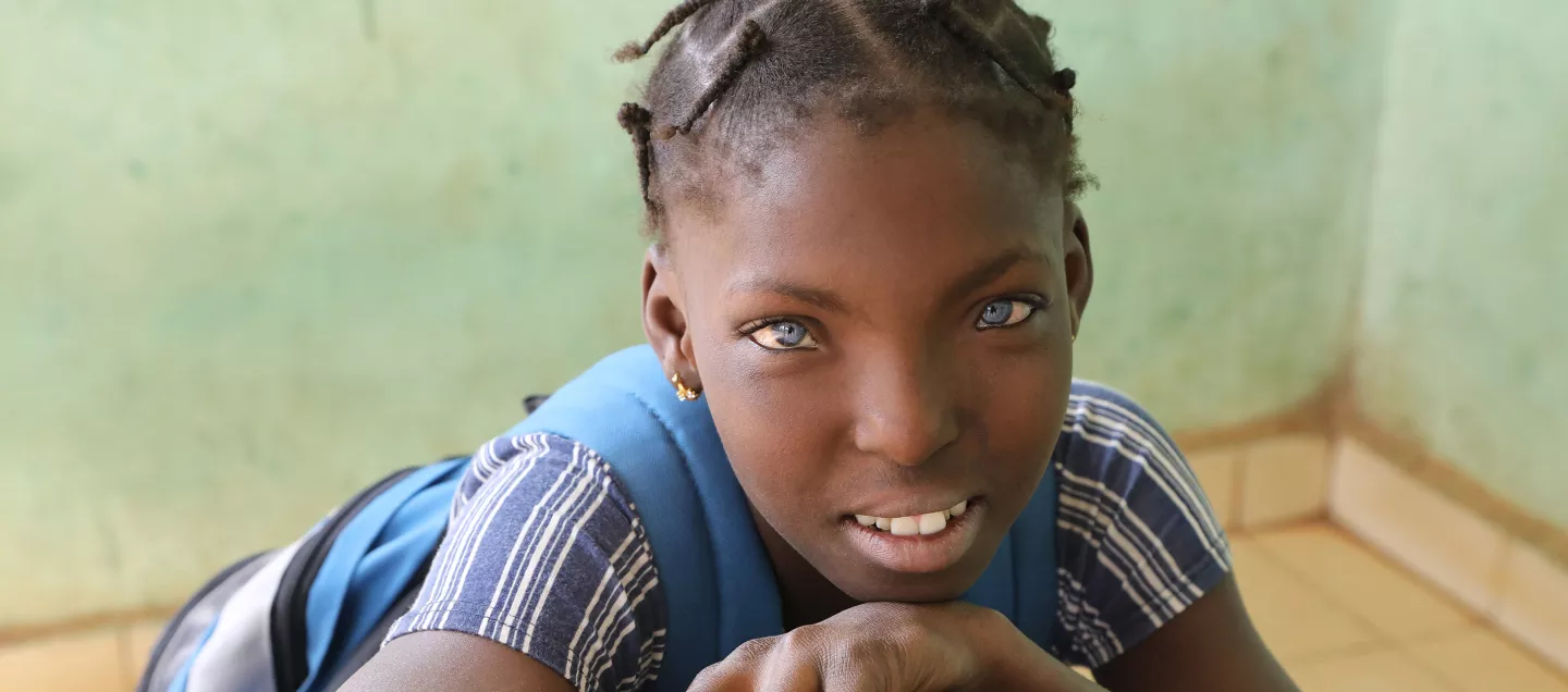 A young woman smiling