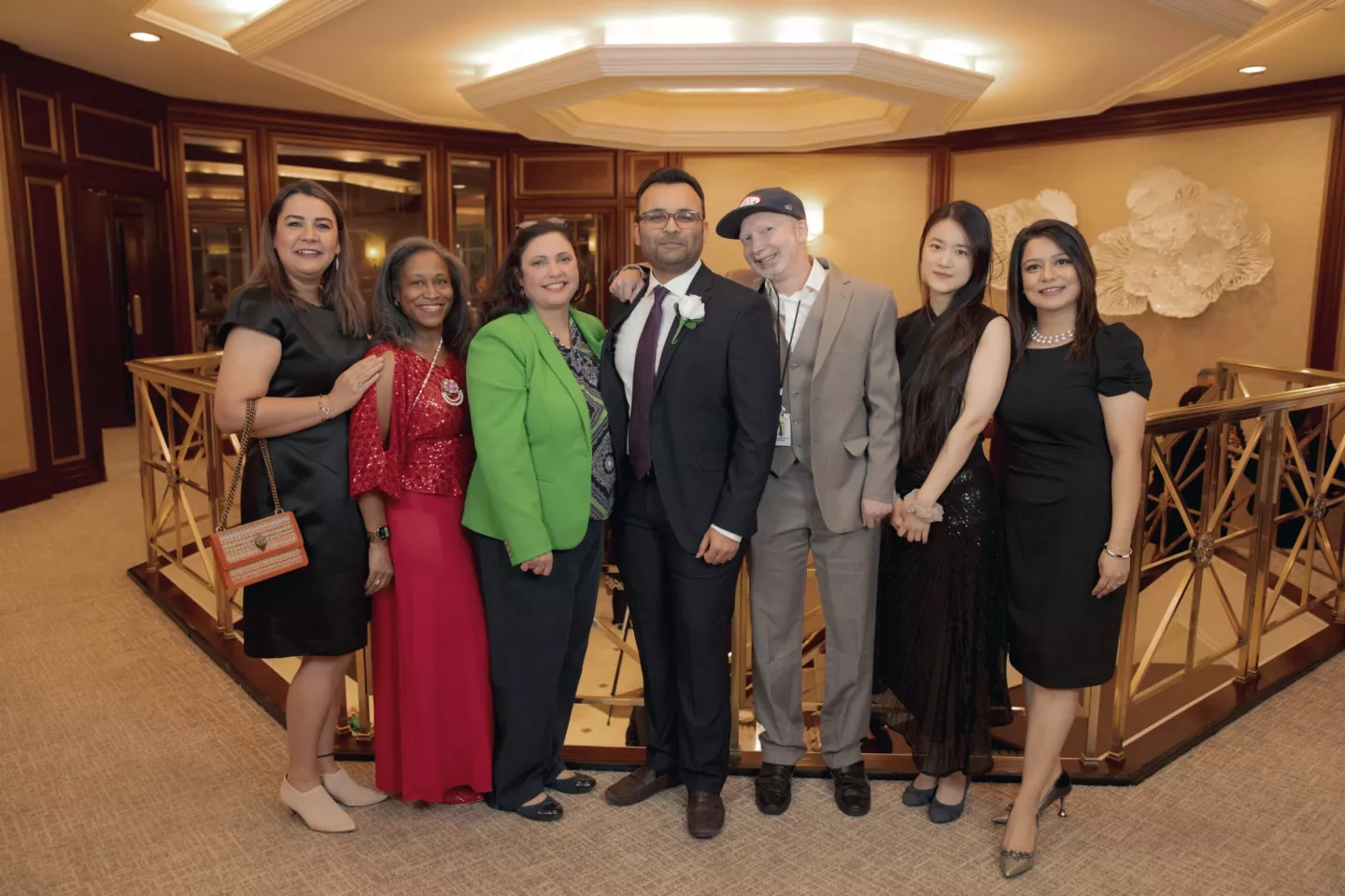Dr. J. Justin Mulvey, fifth from right, with colleagues at the recent Alumni Association awards dinner. From left: Drs. Preeti Malik, Tiffany Hebert, Jennifer Oliver-Krasinski, Fahad Sheih, J. Justin Mulvey, Xing Li, and Anam Fahad. 