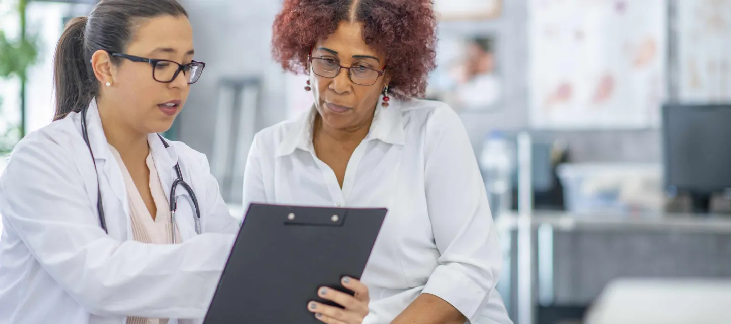 Doctor speaking with patient