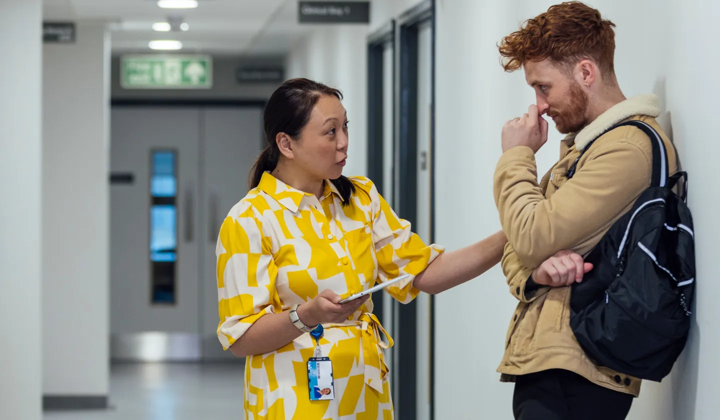 Woman comforts a friend who looks upset during an emotional moment