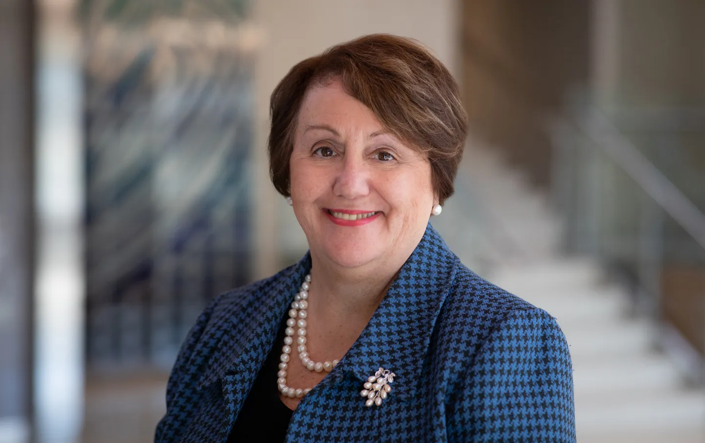 Professional portrait of Carol A. Sheridan, RN, smiling indoors