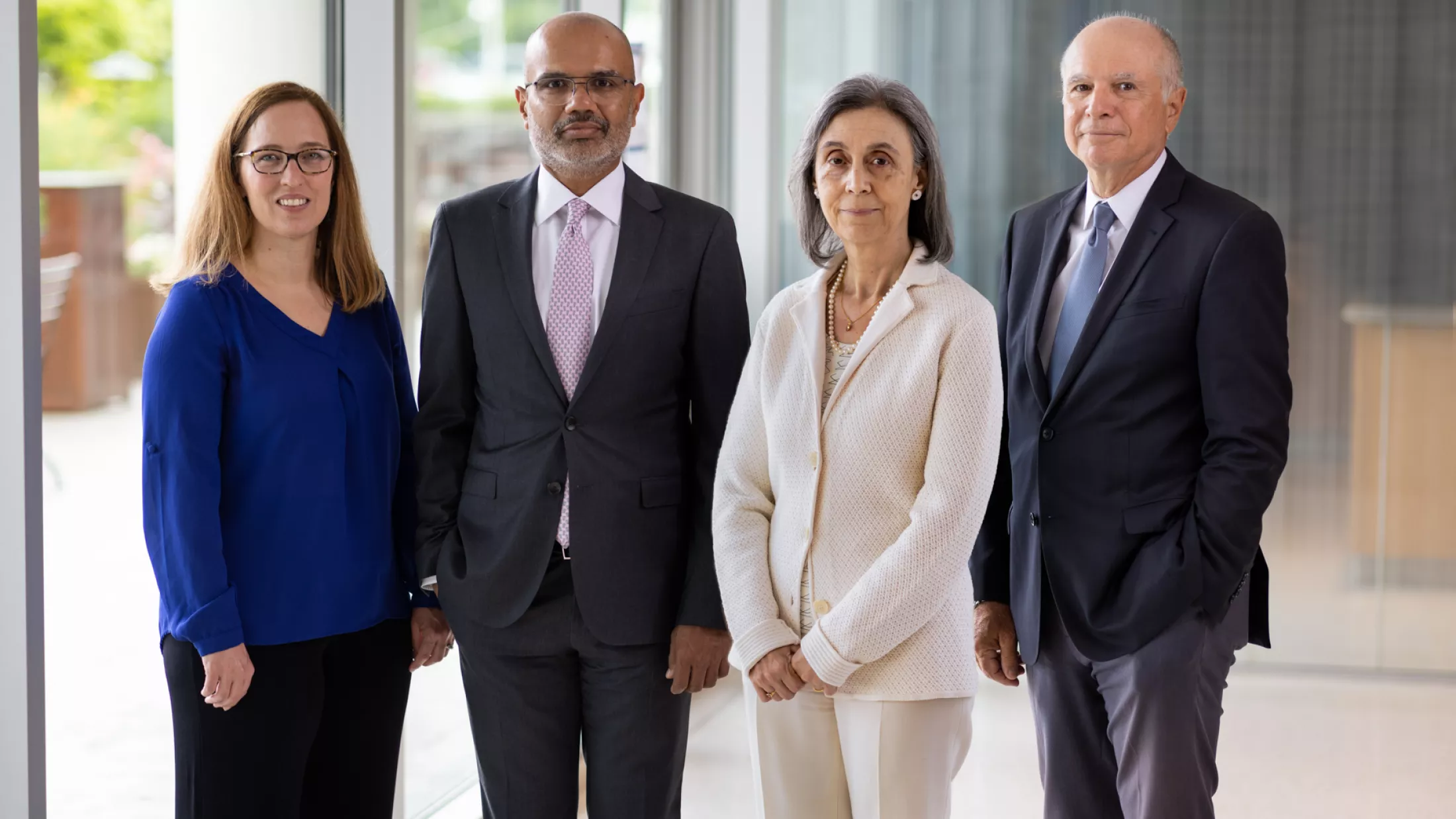 Four doctors posing for picture