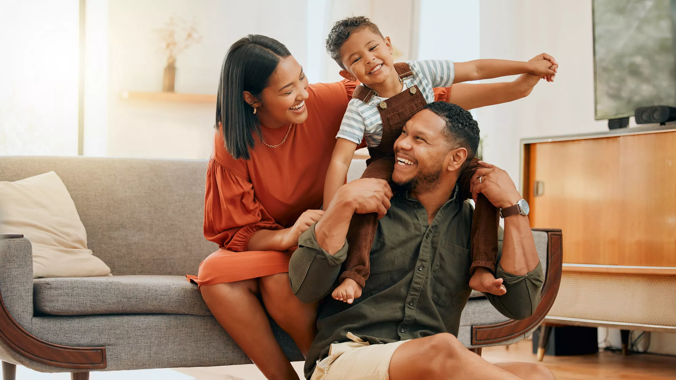 A happy family relaxing in a living room