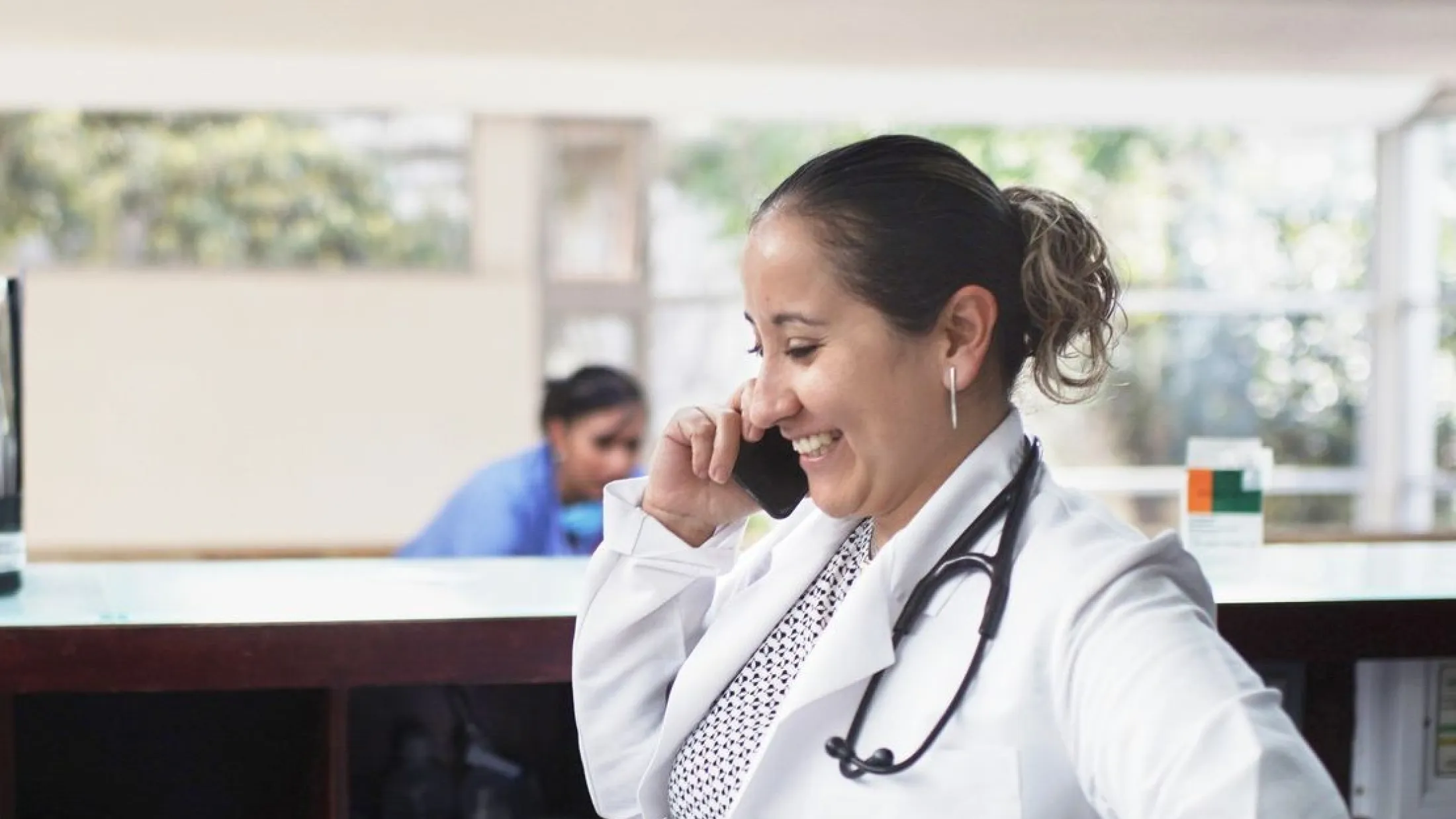 Doctor speaking on phone