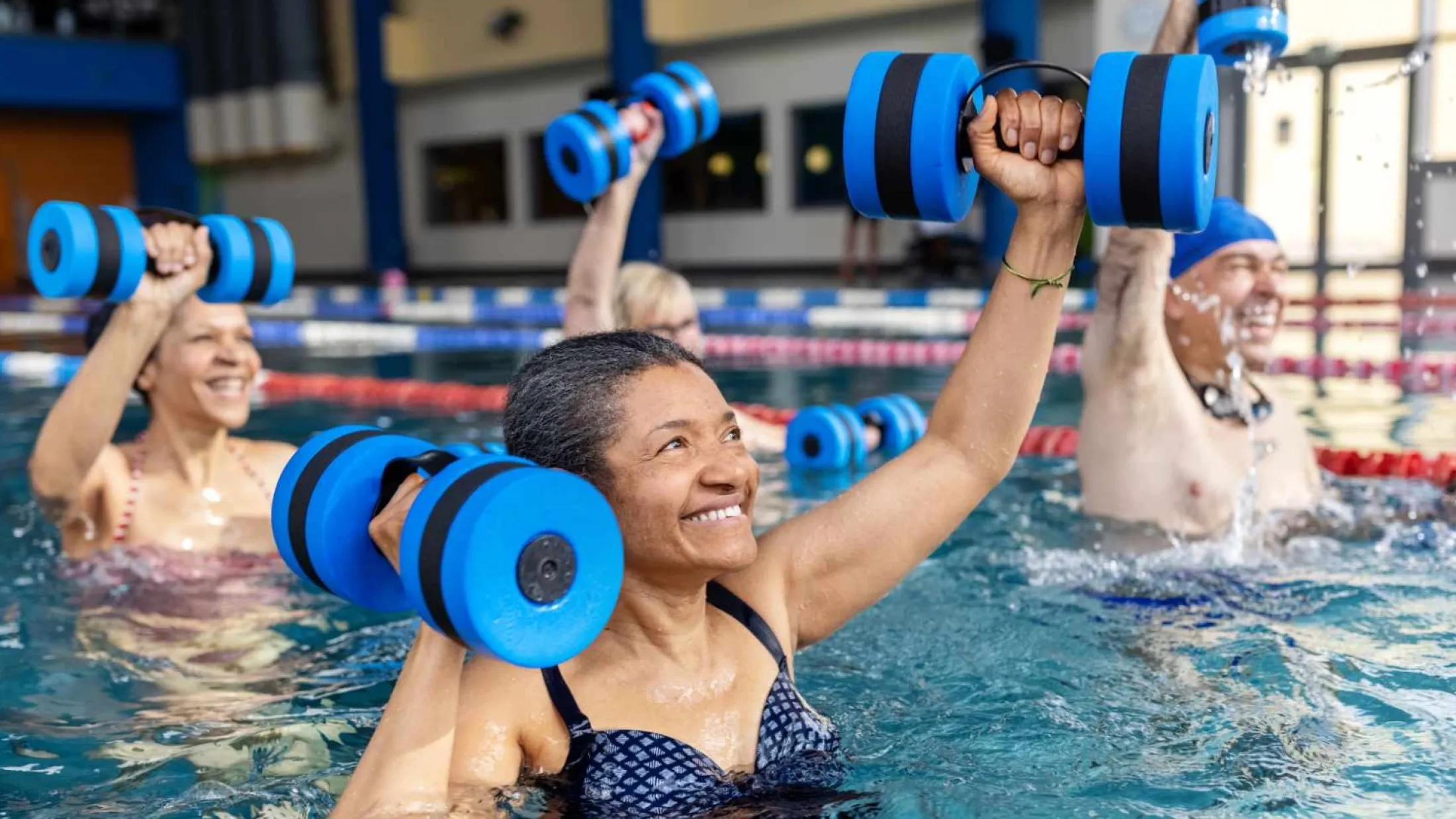 People excersising in a pool