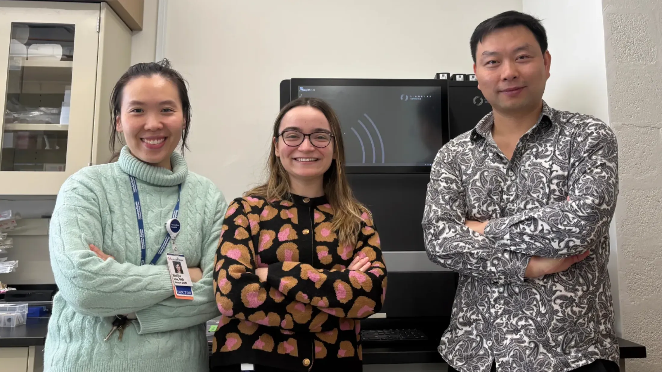 Dr Yin with two lab members