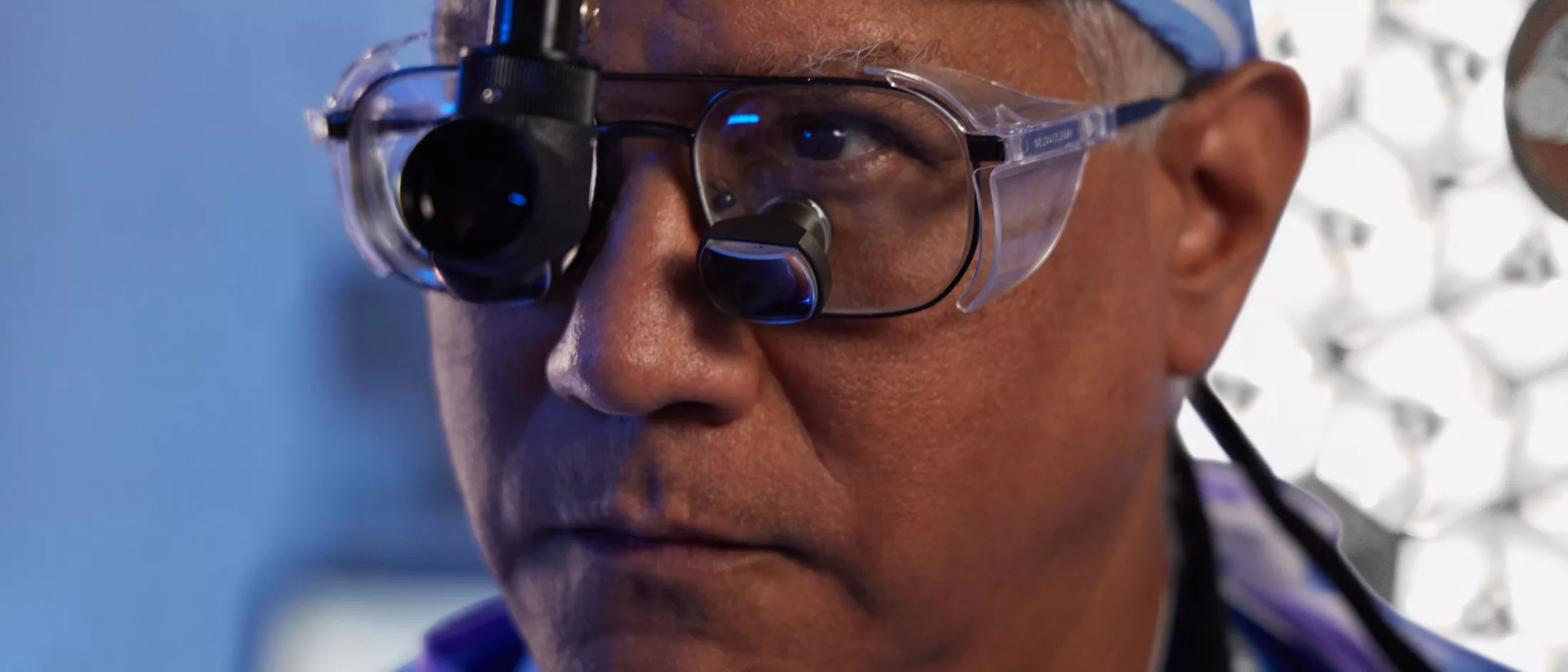 Doctor wearing protective eyewear.