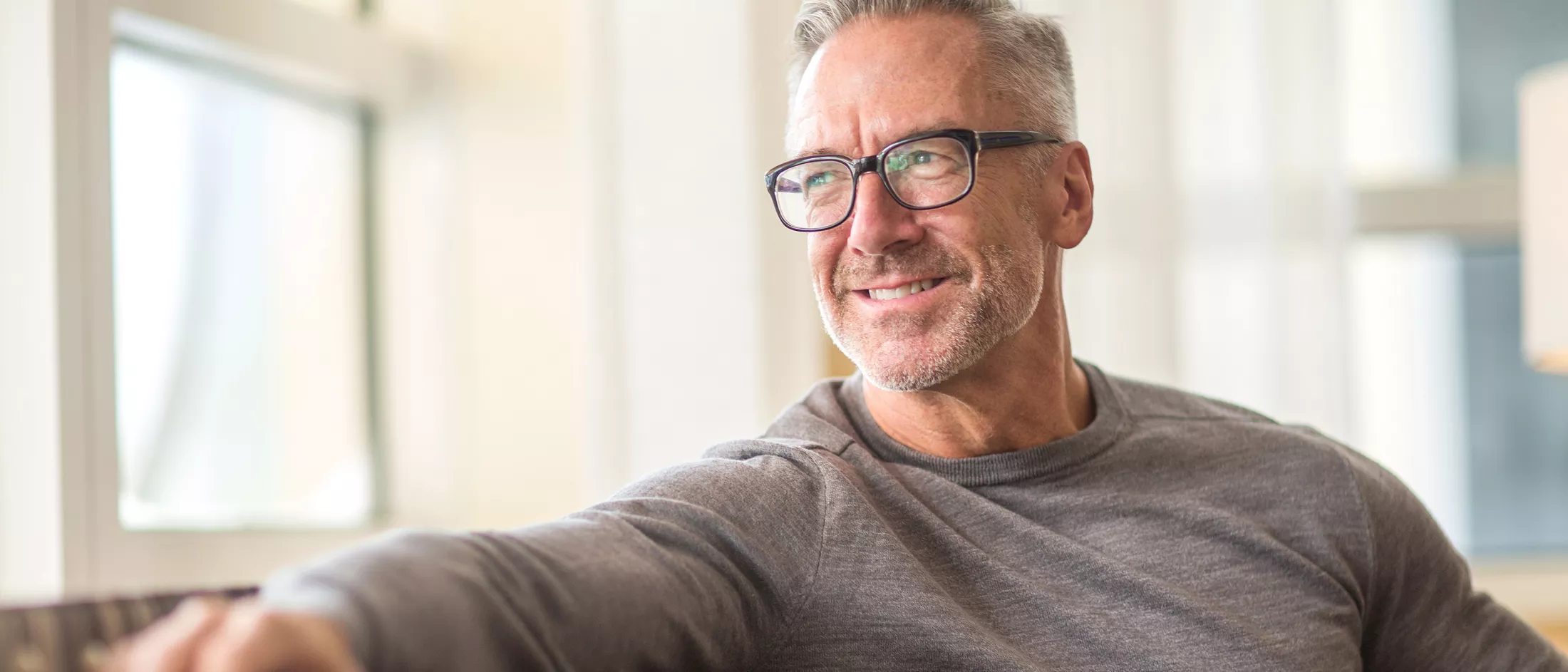 A man looking out the window