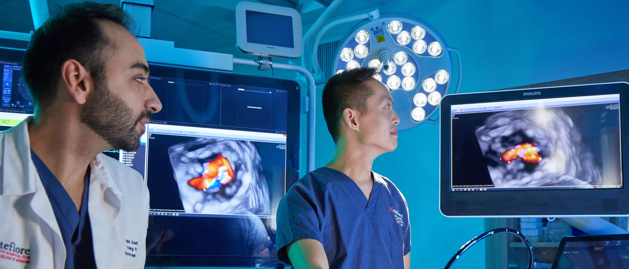 Two physicians looking at an ultrasound