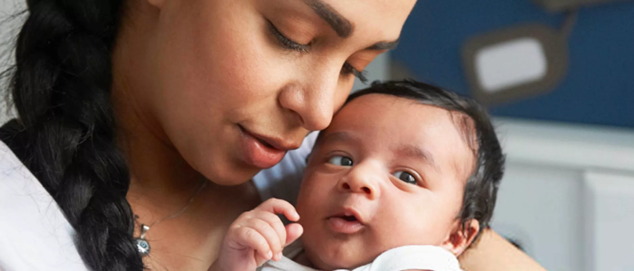 Mother holding her baby