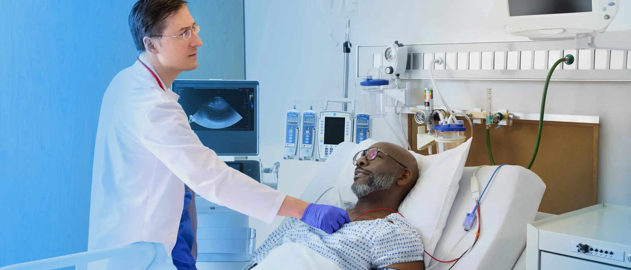 Doctor and patient in hospital room