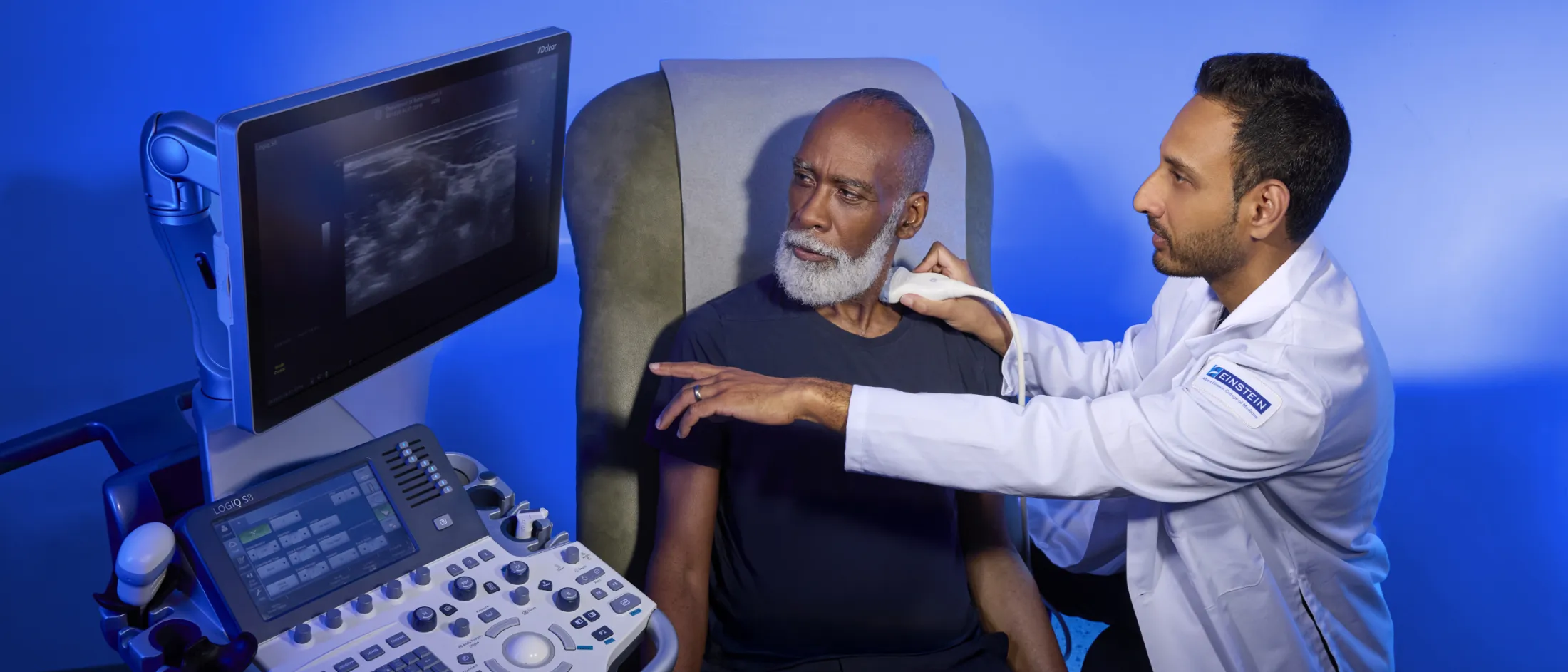 Cancer rehabilitation doctor examining a patient