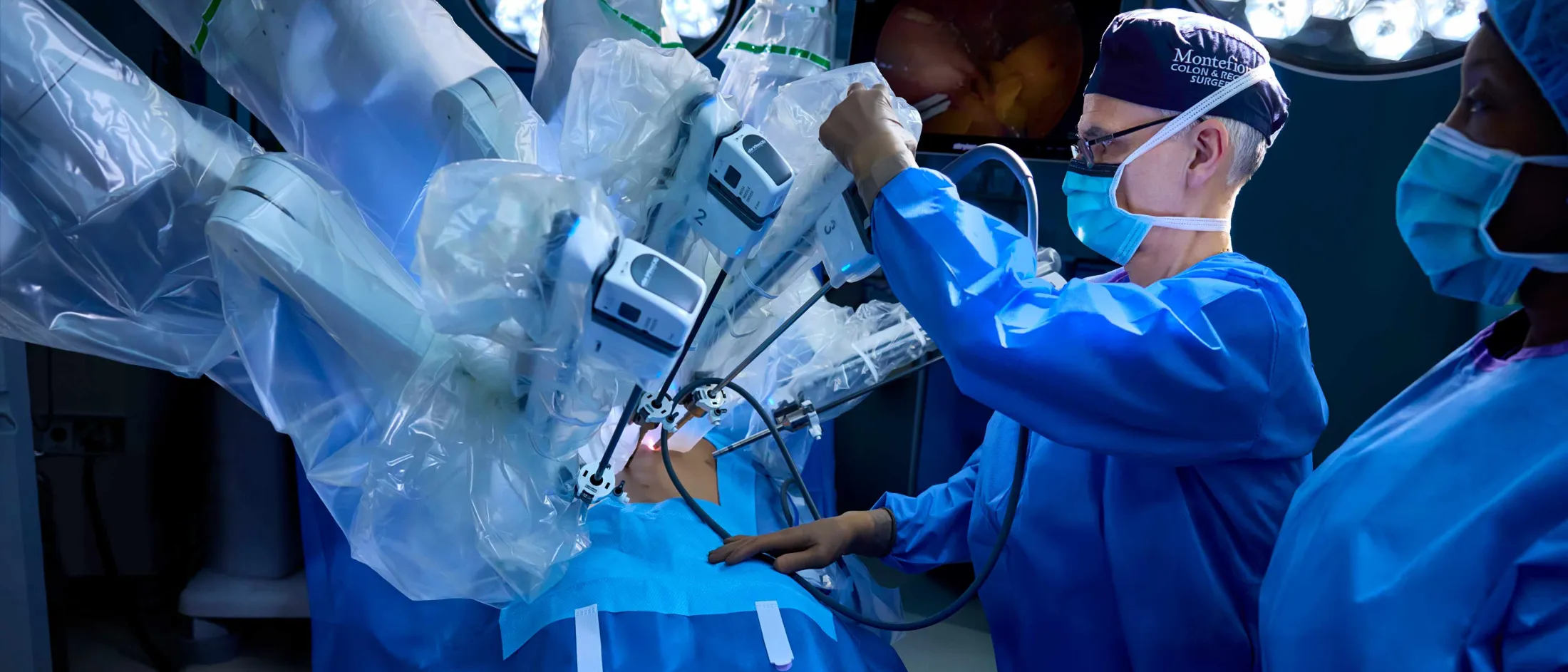 Doctors using a scope to operate