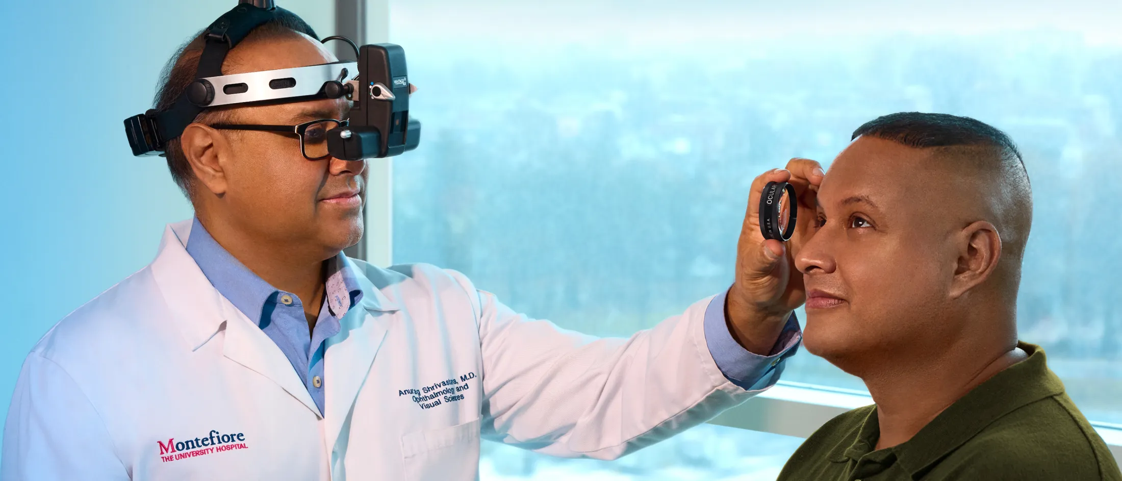 Ophthalmologist sitting with a patient