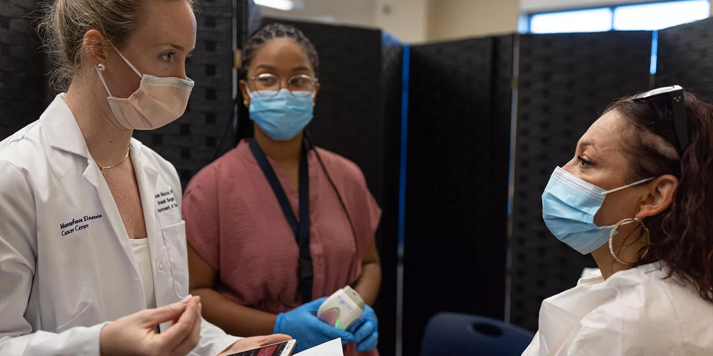 Doctor provides consult for breast cancer screening