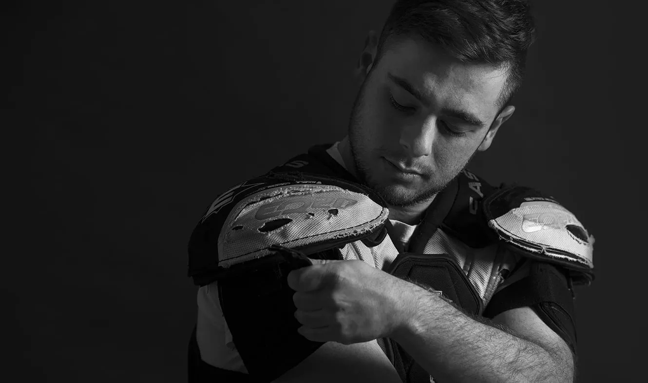 Montefiore Einstein patient Jake adjusting his hockey pads