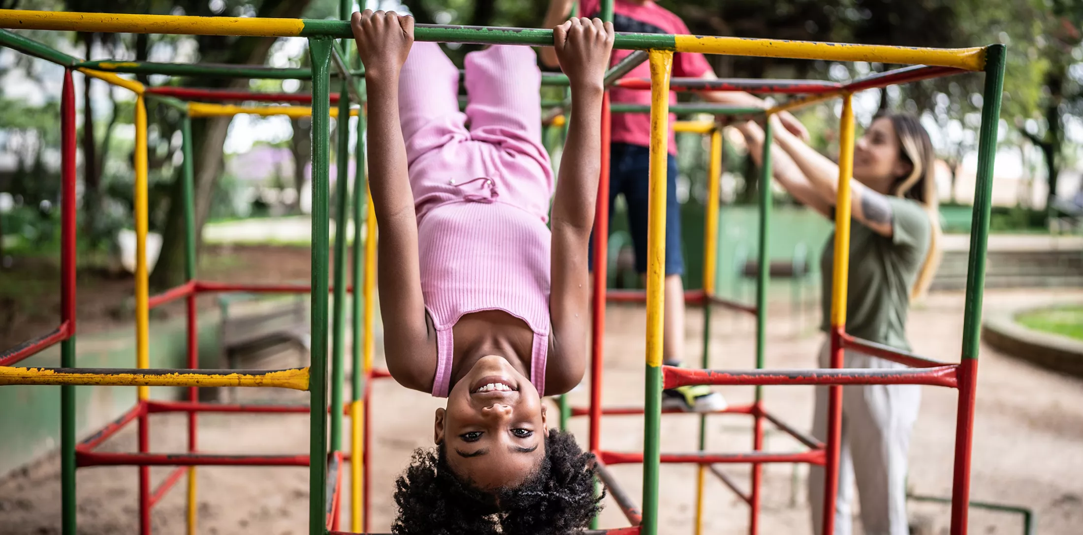 girl-upside-down-on-jungle-gym.jpg