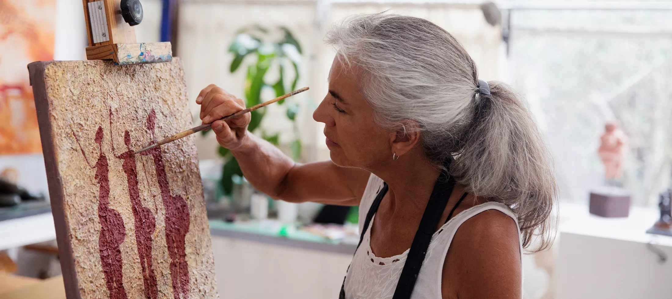 A female artist in her studio.