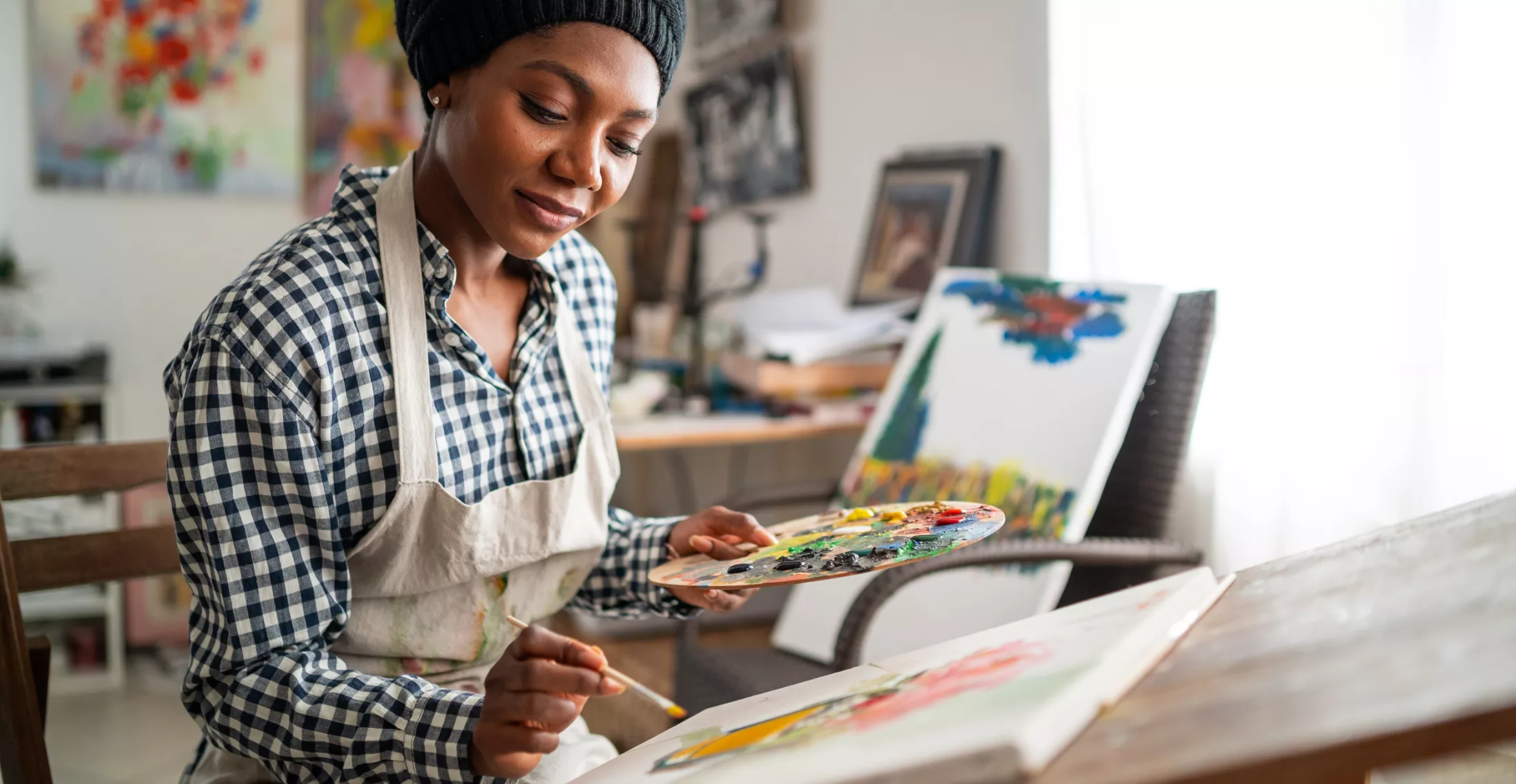Woman painting in an art studio
