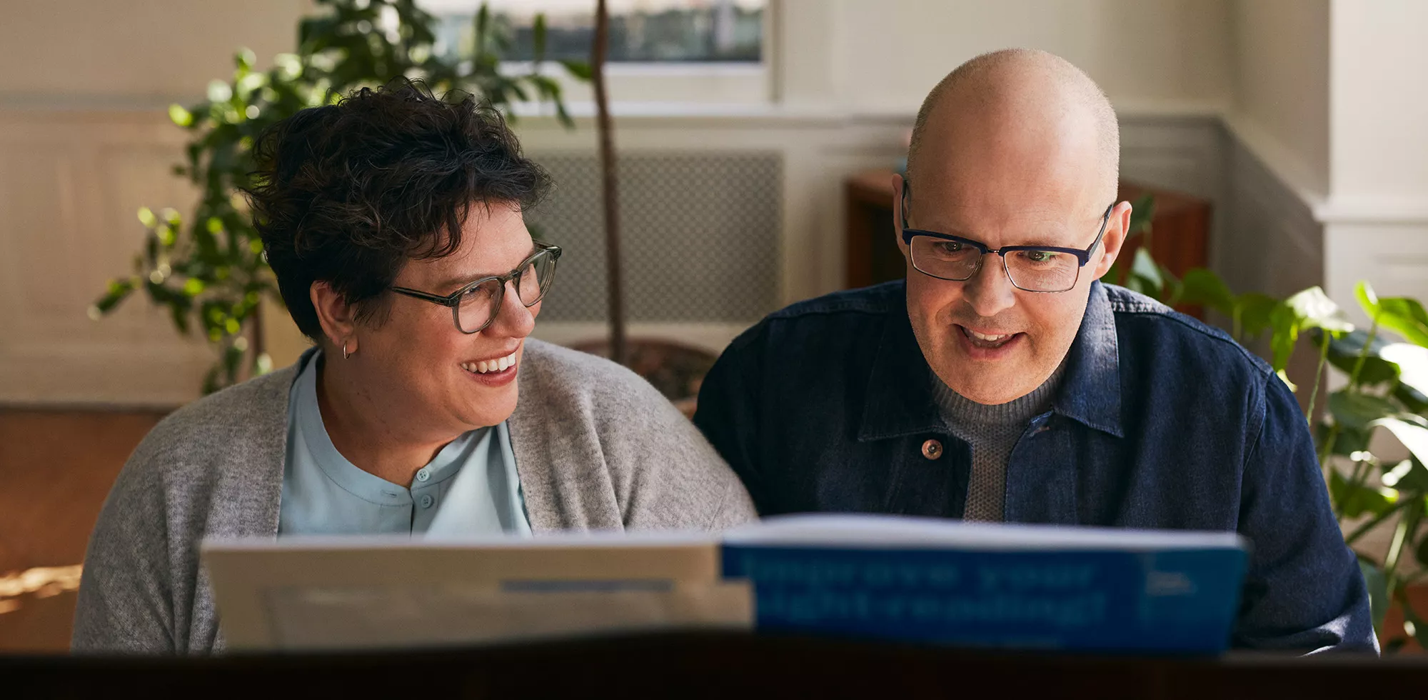 Couple sitting at piano.
