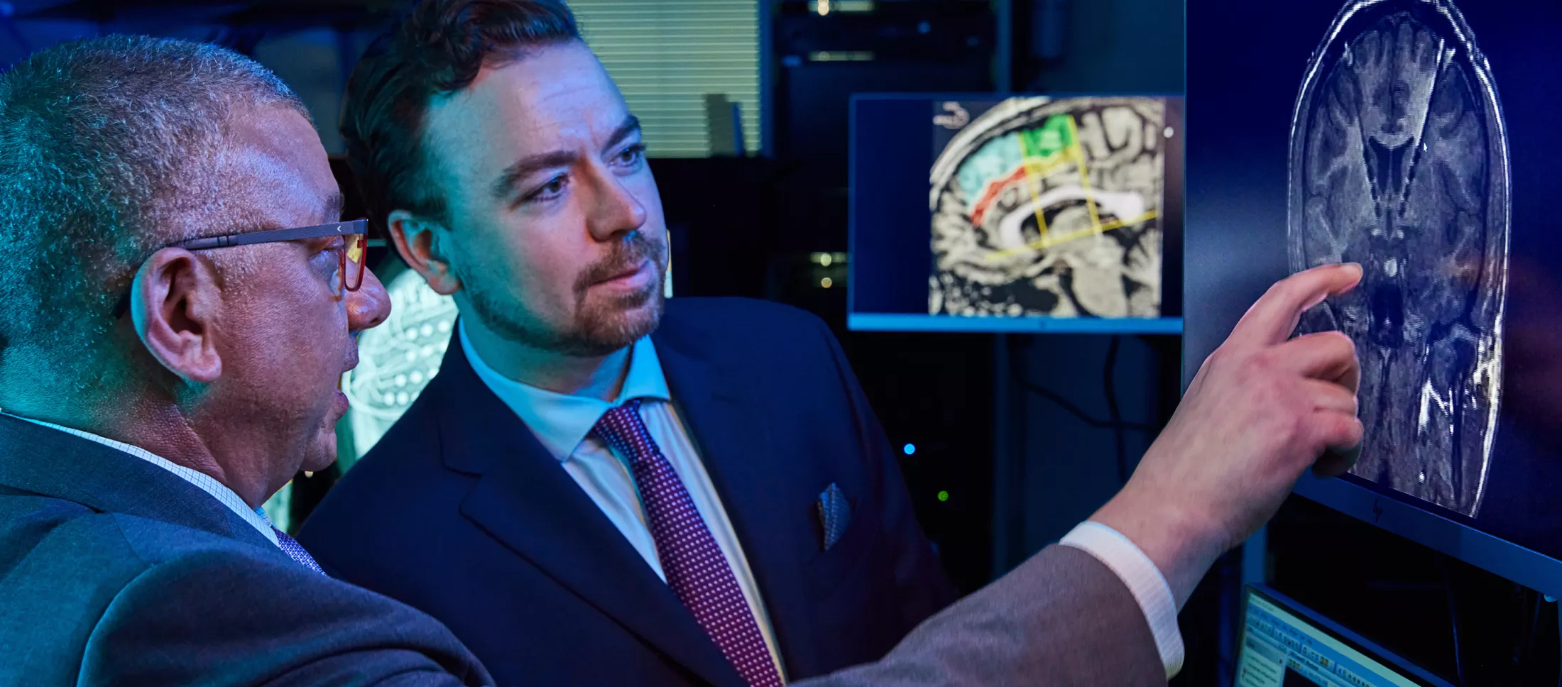 Two doctors looking at a screen