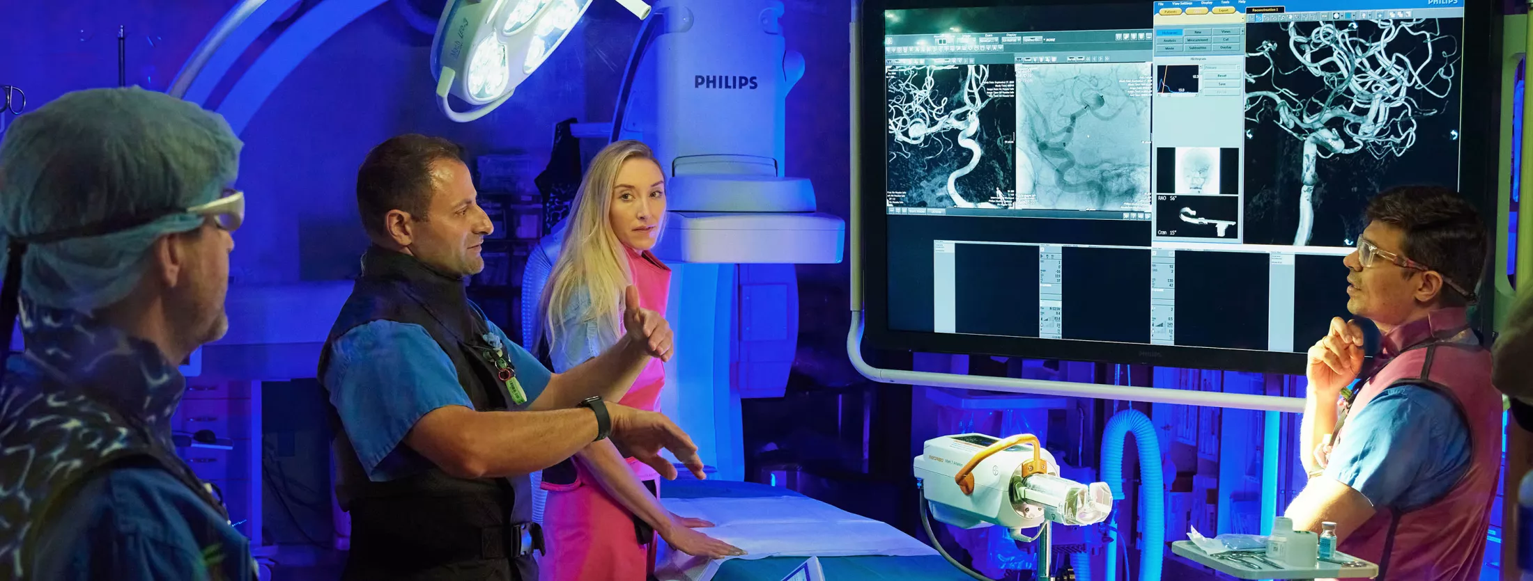 A group of doctors in the angio suite