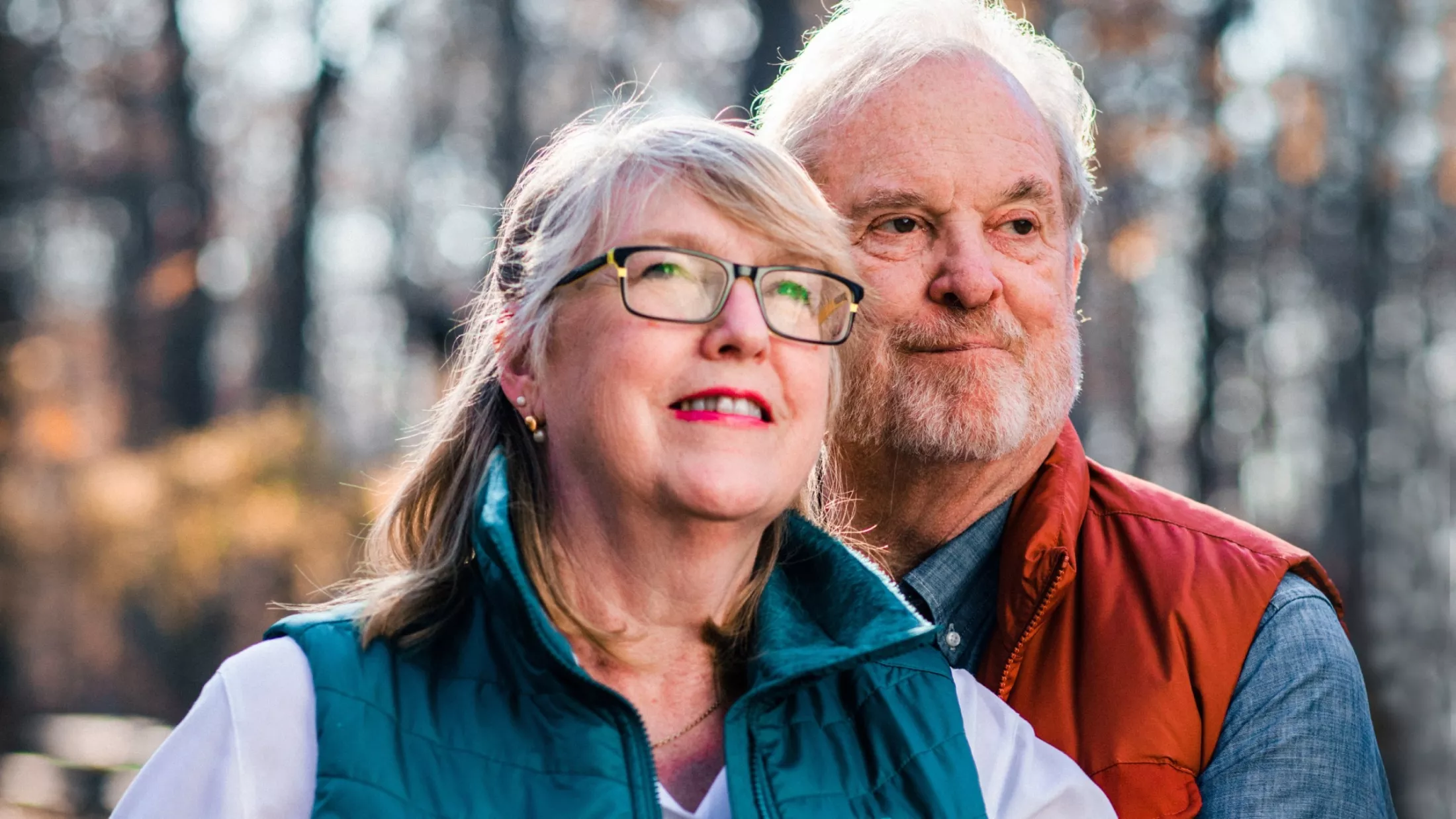 Montefiore Einstein Heart patient, James Bradley, and wife standing in forest
