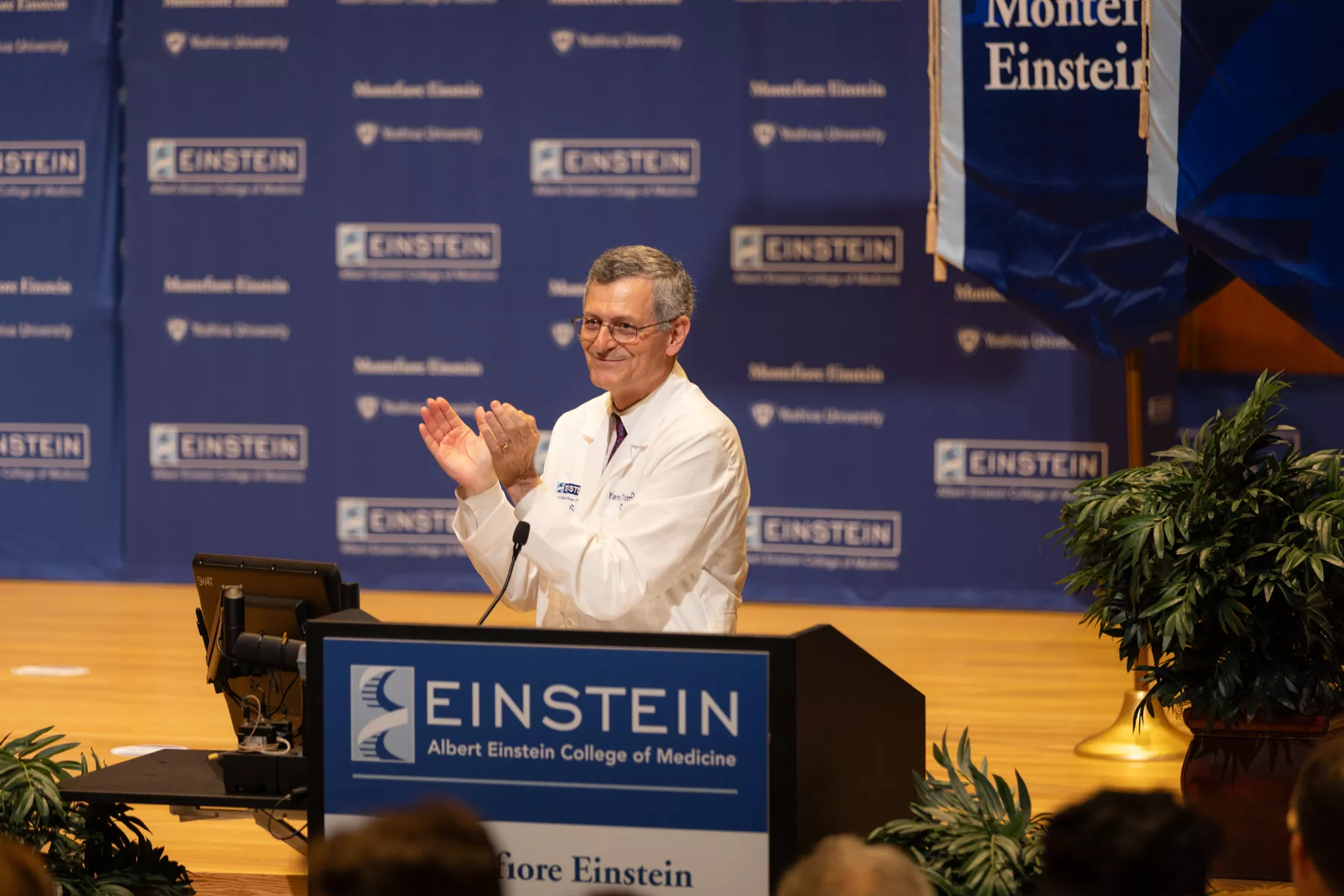 Dean Yaron Tomer, M.D., welcomes students and invited guests to the On Becoming a Physician ceremony.