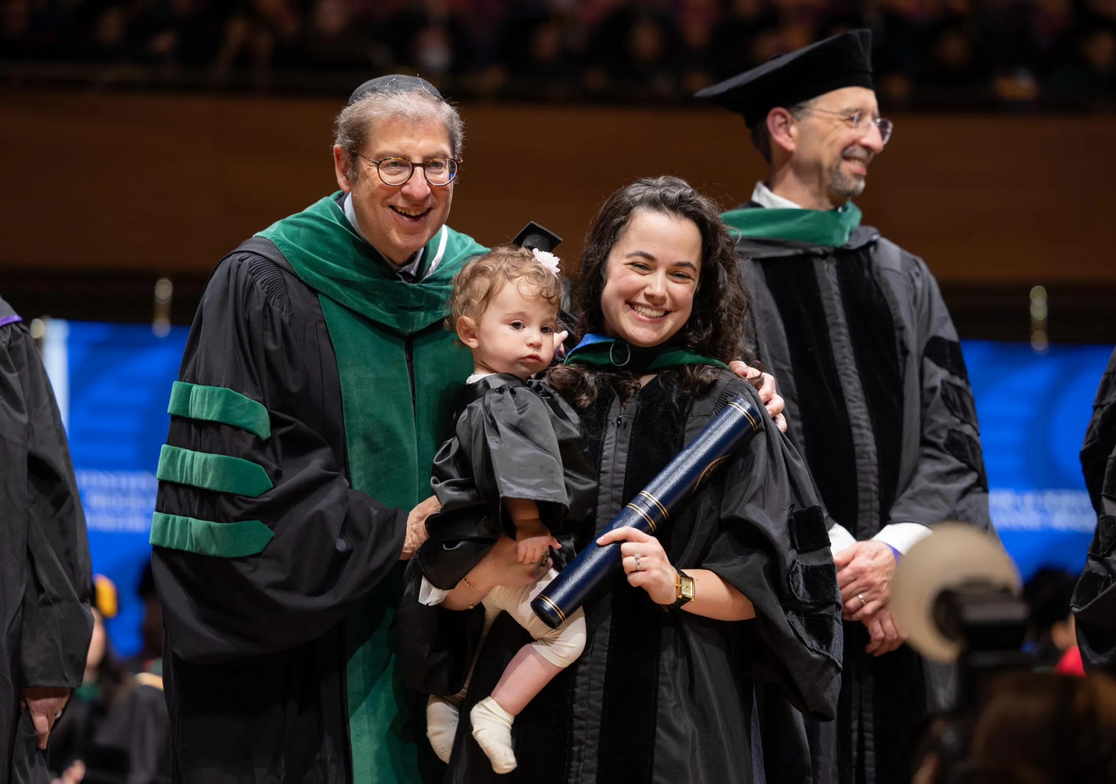 Edward Burns, M.D., poses with graduating medical student