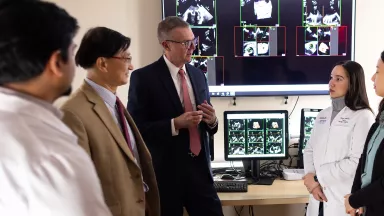 A group of fellows in the Echo Reading Room
