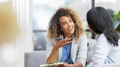 Doctor talking with patient