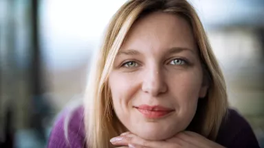 A young woman smiling