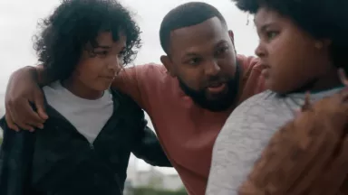 Father Gathered with Children Playing with Baseball