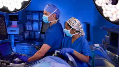 Anesthesiologists working in an operating room.