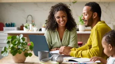 Pharmacy Division - family of 3 at the kitchen table