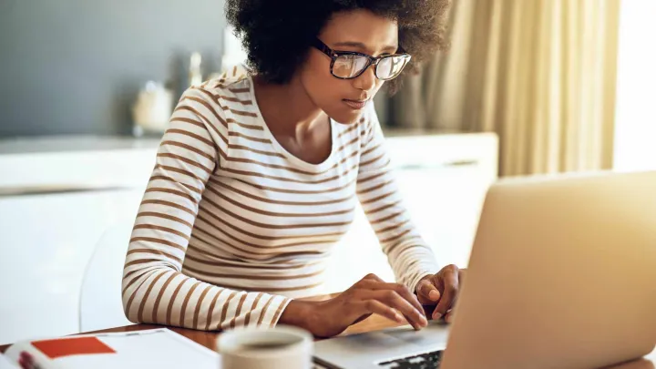 A lady working on her laptop