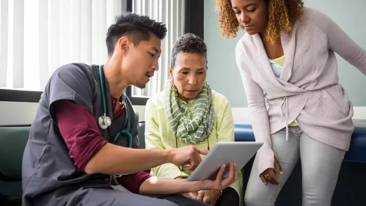Doctor speaking with patients