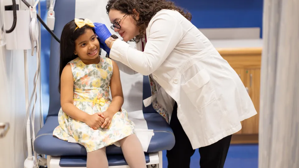 Doctor Examining Child's Ear